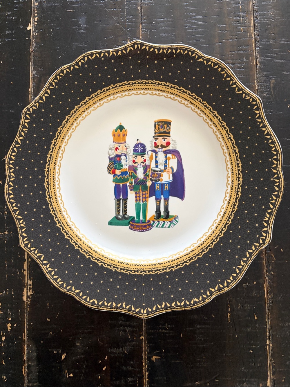 Robert Stanley Nutcracker Holiday Decorative Dinner Plate in Black and Gold